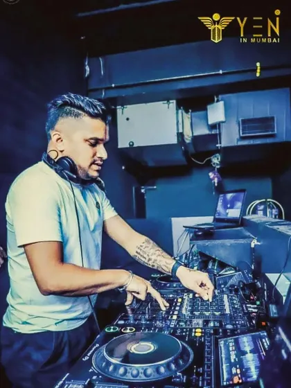 In the booth at Yen, a popular Mumbai nightclub. The setup here is intimate, allowing for a great connection with the audience on the dance floor.