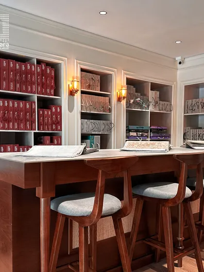 My showroom's consultation area, where clients can browse through my extensive library of fabric and wallpaper books with the help of my design team.