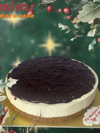 Beyond cupcakes, I also bake full-sized desserts like this classic blueberry cheesecake. It features a rich, creamy filling on a biscuit base, generously topped with a homemade blueberry compote, perfect for any celebration.
