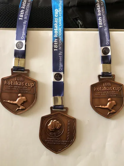 Medals from the 18th Kotakas Cup All India Karate Championship. Each medal is a symbol of the courage and skill displayed by my students during competition.