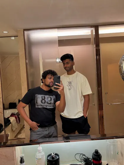 A full-length mirror shot with Mayank Yadav.