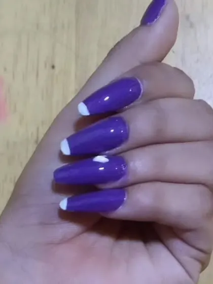 Here is another view of the long coffin-shaped purple nails, showing how elegant a simple heart accent can be. I can customize the colors and accents for you.