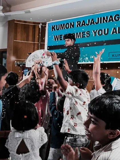 Kids reaching up with excitement during the snow finale. This action shot is full of energy and perfectly captures the climax of my show.