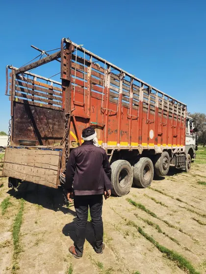 A final check before the truck departs. We are committed to reliable and timely delivery.