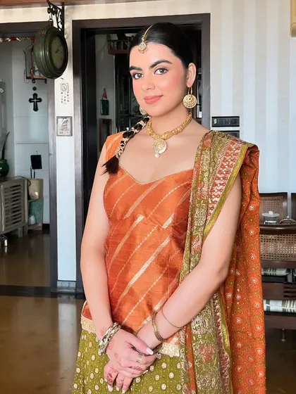 The complete look, showcasing the beautiful blend of traditional attire and modern, subtle makeup.
