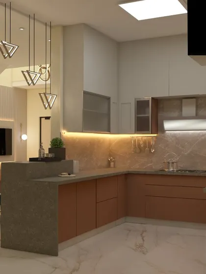 This open kitchen features a peninsula with a breakfast bar, creating a natural divide from the dining area. The earthy brown cabinets and marble-patterned backsplash give the space a warm and elegant feel.