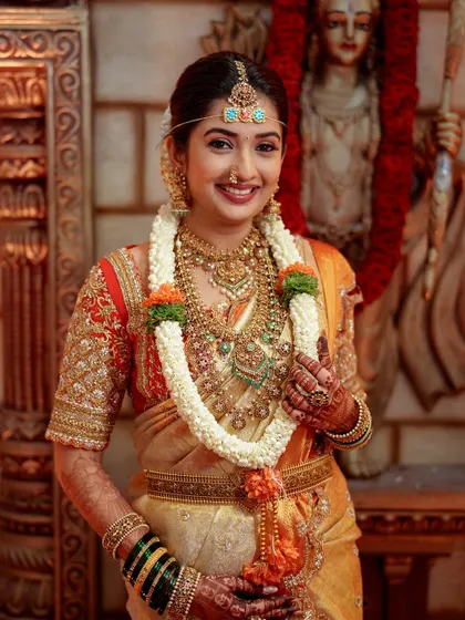 For Sonal Monteiro's wedding, every detail mattered. I designed this heavily embroidered bridal blouse to be the centerpiece of her look. The intricate zardosi work and traditional motifs were crafted to complement her Kanchipuram saree, creating a timeless South Indian bridal ensemble.