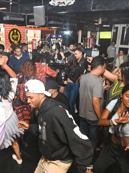Another angle of a Saturday night session. The energy is high, and the crowd is loving the hip-hop and dance music mix.