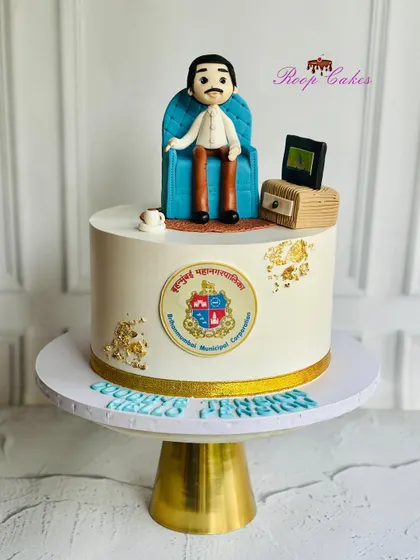 Goodbye tension, hello pension. A sweet tribute to years of dedication at BMC, this cake features a custom fondant figurine, a miniature desk, and the municipal corporation's logo.
