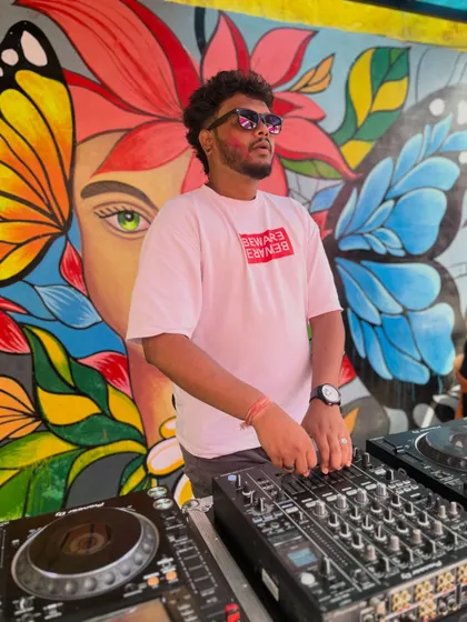 A different angle from the same vibrant Holi party. The butterfly mural behind me perfectly captured the free spirited vibe of the day's music and celebration.