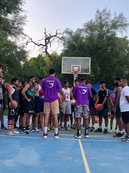 The whole group gathered around for instruction. We are all students of the game.