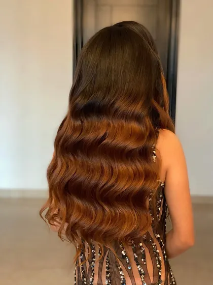 Nothing says glamour like classic Hollywood waves. My extensions provide the perfect canvas to create these deep, uniform waves for a truly red-carpet-worthy hairstyle.