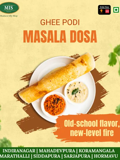 Here is our Ghee Podi Masala Dosa, a true classic with a fiery twist. We roll a crispy dosa with our potato masala and generously sprinkle it with our spicy podi for an extra layer of flavor.