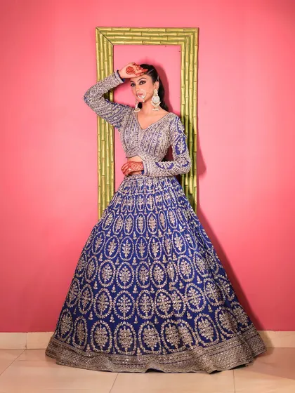 Another full-length shot of the royal blue lehenga, perfect for a wedding guest who wants to look elegant.