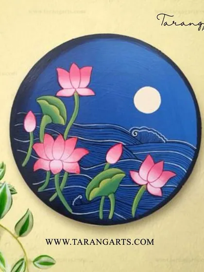 A Pichwai-style hand-painted wall plate depicting lotuses under the moonlight. The deep blue background and serene composition create a tranquil and artistic ambiance in any room.