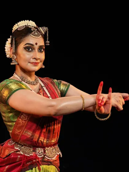 A direct and engaging gesture, inviting the audience into the story.