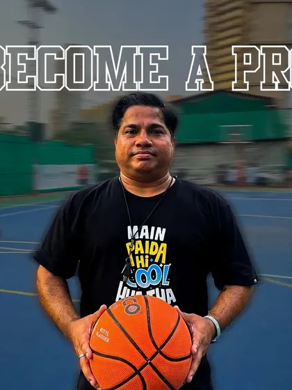 One of our dedicated basketball coaches ready for a session. I am here to help you become a pro on the court.
