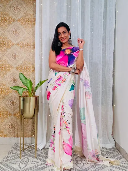 A beautiful floral printed ready-to-wear saree. The print is so pretty and feminine, and the pre-stitched format makes it effortless to wear.