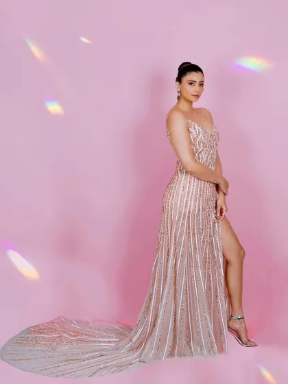 A classic three-quarter portrait of Daisy Shah. This pose is ideal for magazine features and promotional materials, offering a clear view of the styling and a strong connection with the viewer.