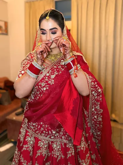 A playful moment captured. This shows that my bridal makeup is not just for pictures; it's for living and enjoying your special day to the fullest.