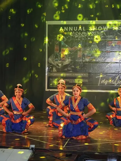 Our students in a traditional Bharatanatyam pose, a classical dance form that requires immense grace and precision.