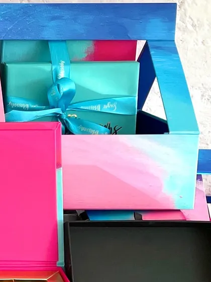 This unique window box is part of my Diwali collection. It offers a sneak peek of the beautifully packaged treats nestled inside.
