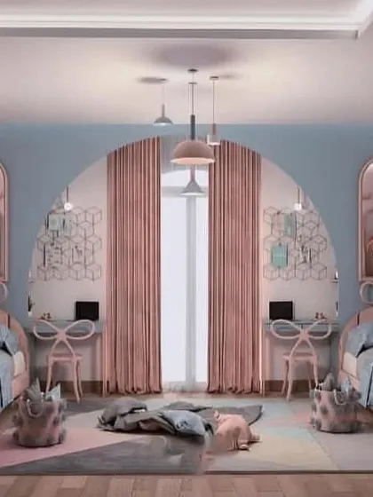 A perfectly symmetrical room for two, featuring twin beds, matching desks, and beautiful arched wall details. The soft pink and blue color palette creates a harmonious and balanced look.