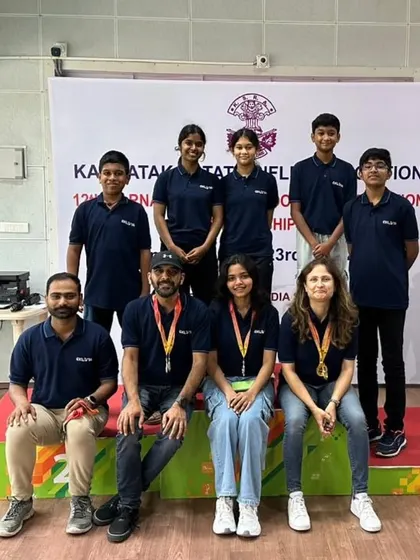 The Eklavya team, a mix of shooters and coaches, posing after a successful campaign at the state championship.