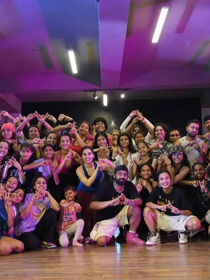 The full group from the collab intensive, buzzing with energy.
