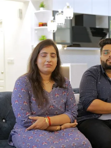 A candid shot of Shekhar and his wife during their testimonial video, sharing their positive experience with my personalized design process.