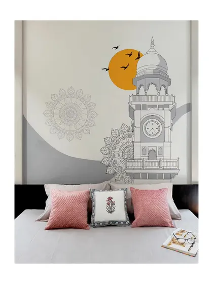 A custom wall mural depicting the local clock tower adds a personal and artistic touch to this bedroom in the '22'x110' House'.