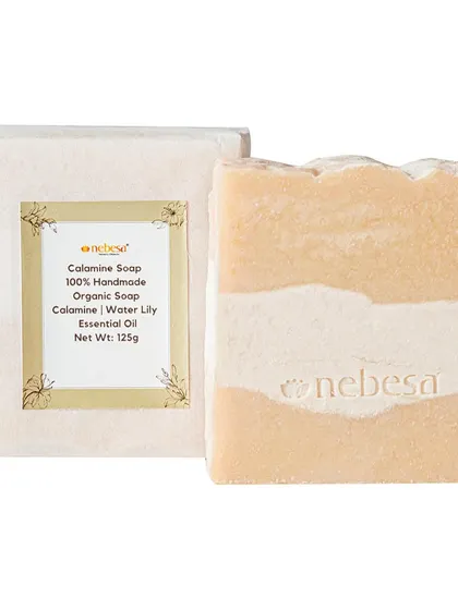 My Calamine Soap, shown here with its simple, elegant packaging. It is a 100% handmade organic soap infused with the gentle scent of water lily essential oil.
