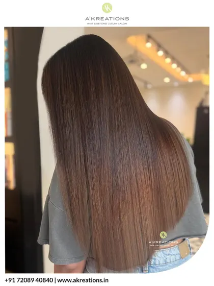 A fresh haircut paired with a stunning brown color melt. The result is sleek, healthy-looking hair with beautiful, subtle dimension.