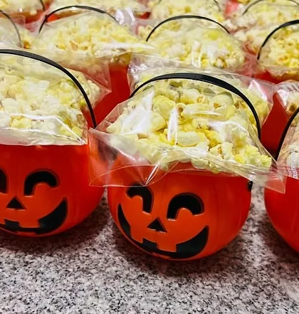 A little trick and a whole lot of treat. These spooky pumpkin buckets filled with popcorn were part of a last-minute Halloween order that my team and I pulled off in just 48 hours.