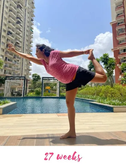 A beautiful Dancer's Pose (Natarajasana) by the pool at 27 weeks. It's all about finding what feels good in your body.