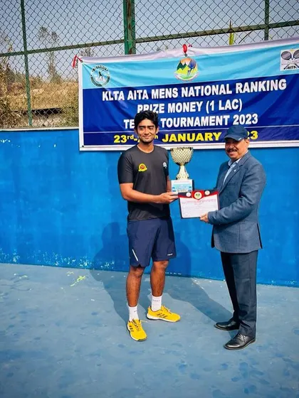 Our player Iftikhar receiving his winner's trophy at the AITA 1 lakh tournament in Meghalaya.