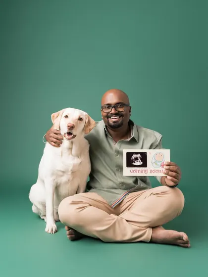 Another great shot of the dad and dog duo, ready to welcome the new baby. These photos make for wonderful memories and announcements.