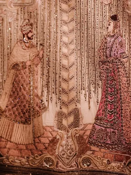 A groom's sherwani with the couple's love story embroidered on it. I work with my clients to incorporate these incredibly personal and unique details into their wedding.