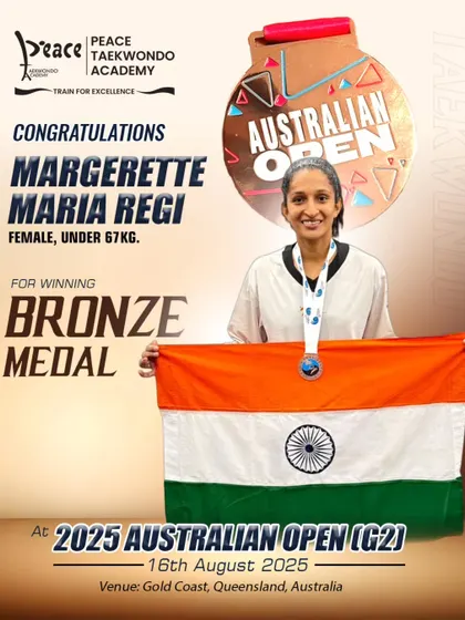 Margarette Maria Regi with the Indian flag after winning a bronze medal at the 2025 Australian Open. Her consistent performance on the international stage is a source of immense pride for our academy.