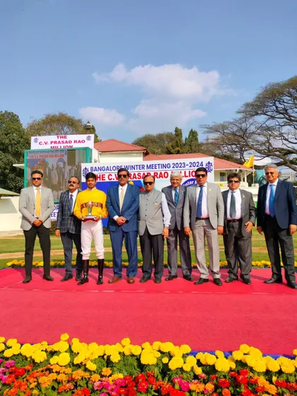 The presentation ceremony for The Dr. T. Thimmaiah Memorial Cup with the winning team of Stellar Gold.