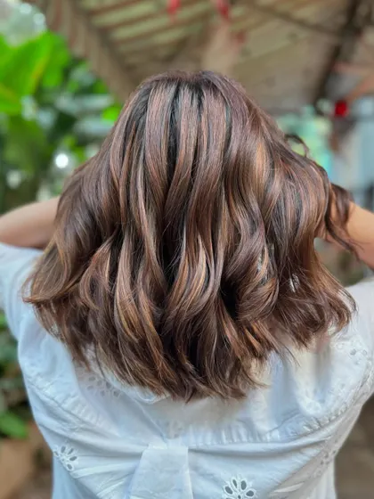 The back view of this brown sugar lob shows off the beautiful, subtle highlights and healthy shine. (No filter)