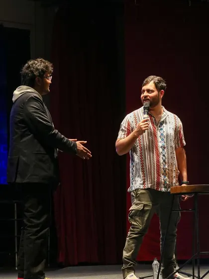 Devesh Dixit being welcomed on stage at the Axis fest.