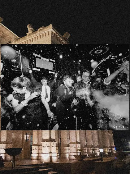 A black and white photo capturing the wild celebration of a champagne spray at the after-party.