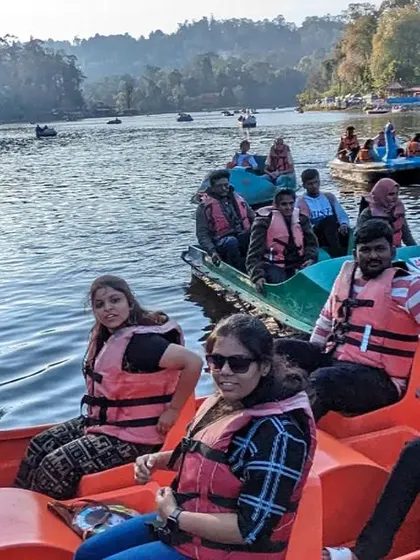 A duplicate shot of the happy group in their pedal boat.