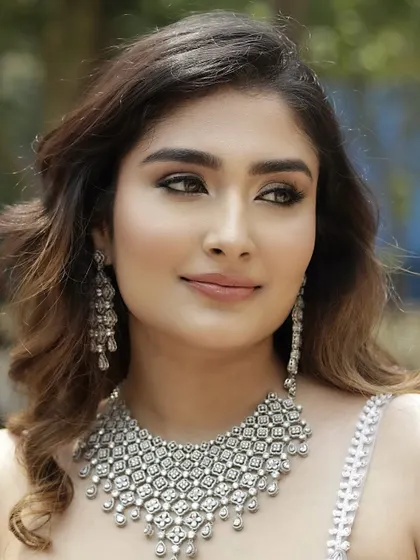 The 'Sitara' look, radiant in silver. This sultry, glamorous style with defined eyes and a nude lip is made to steal the spotlight at your evening soirée.