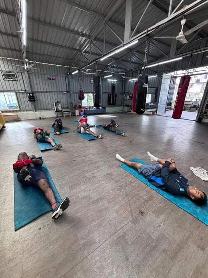 This stretch focuses on the glutes and lower back. We make sure to guide everyone through a full-body stretching routine to aid muscle recovery.