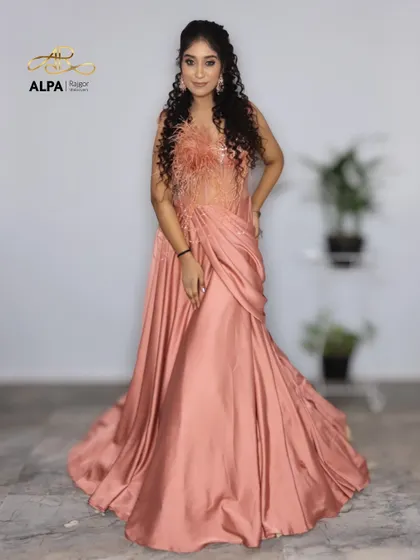 A full-length pose showing the confident stance of the model in her stunning cocktail attire.