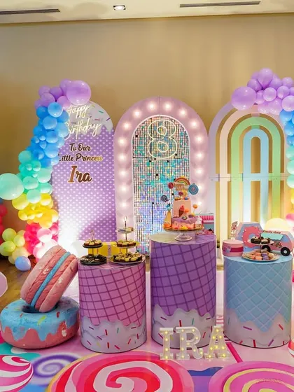 A wider view of the incredible candy land theme for Ira's 8th birthday. Capturing the entire setup shows the scale and effort that went into creating such a magical atmosphere for the kids.