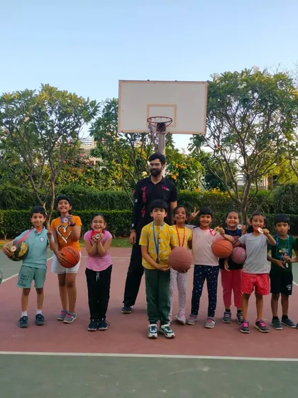 A group photo of our young players and their coach after a successful Ranking Day.