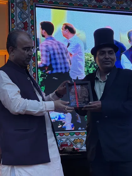 Receiving my award at the Bapu Auditorium in Patna. The event was a super success, and this honor was the perfect end to two days of non-stop magic.